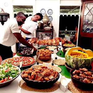 Staff serving buffet dinner