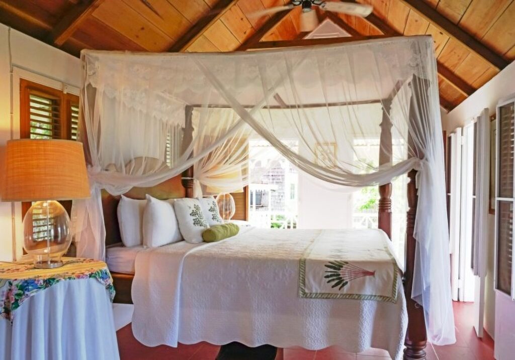 Canopy bed in a four-person gingerbread cottage