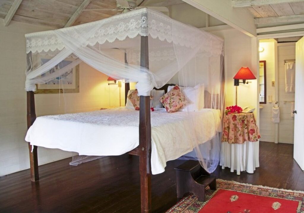 Four-poster bed in a three-person gingerbread cottage