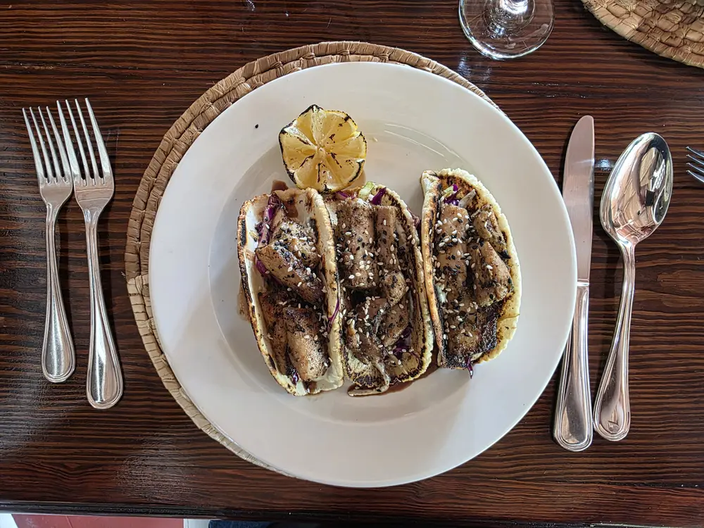 A plated fish dish at Hermitage Nevis