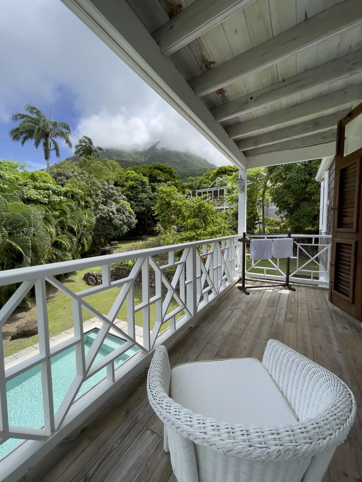 Upstairs verandah at Rose Villa looking down over the private pool towards Nevis Peak