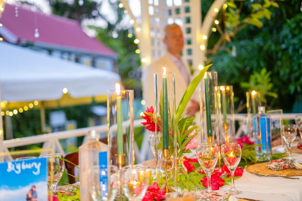 Candles and tropical floral decorations on a wedding table at Hermitage Nevis