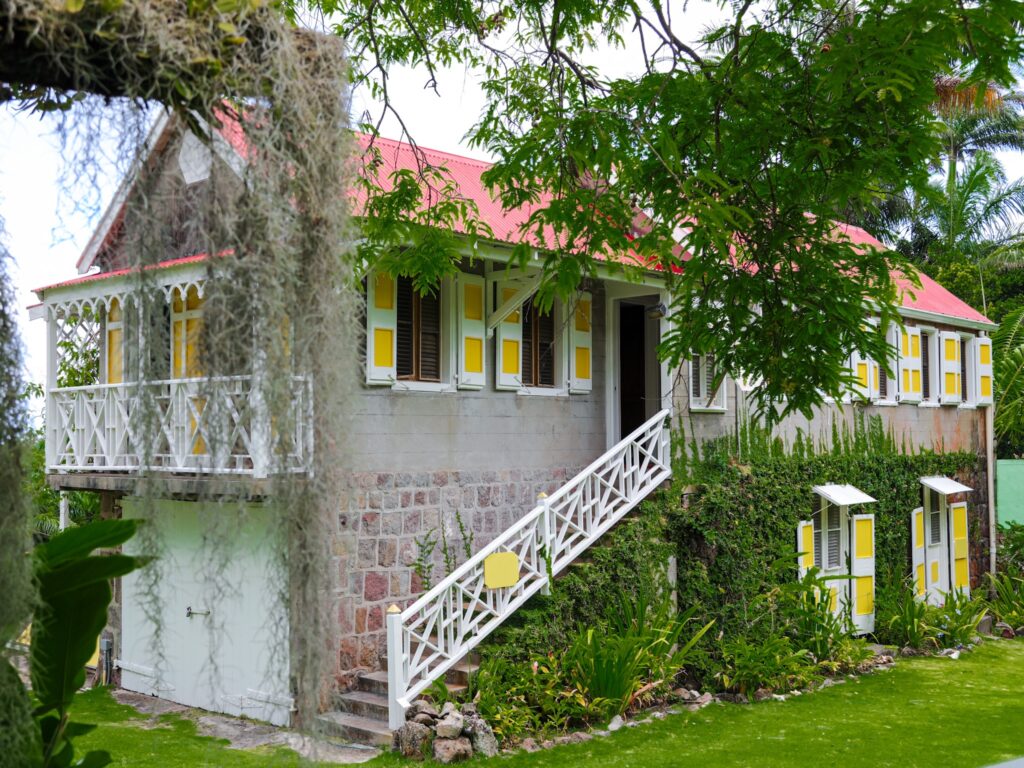 Exterior staircase to a first-floor gingerbread cottage